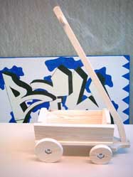 Spielzeugwagen mit
Deichsel Spielzeugwagen mit Deichsel
